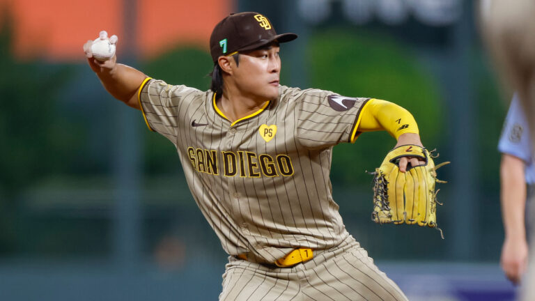 DENVER, COLORADO - AUGUST 16: Ha-Seong Kim #7 of the San Diego Padres throws to first base for an out in the seventh inning during a game against the Colorado Rockies at Coors Field on August 16, 2024 in Denver, Colorado. (Photo by Brandon Sloter/Image Of Sport/Getty Images)