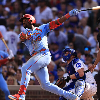 CHICAGO, ILLINOIS - SEPTEMBER 27: Jordan Walker #18 of the St. Louis Cardinals hits a home run during the seventh inning against the Chicago Cubs at Wrigley Field on September 27, 2025 in Chicago, Illinois. (Photo by Geoff Stellfox/Getty Images)