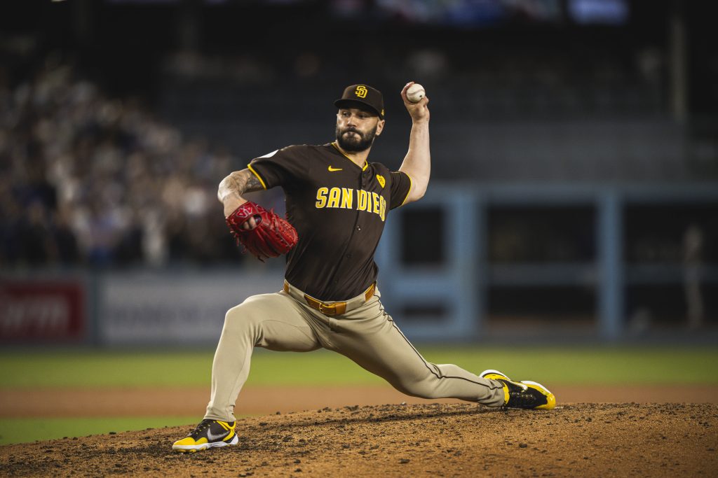 Top free agent reliever Tanner Scott (then of the San Diego Padres) pitches in the eighth inning of game five of the National League Divisional Series against the Los Angeles Dodgers at Dodger Stadium.