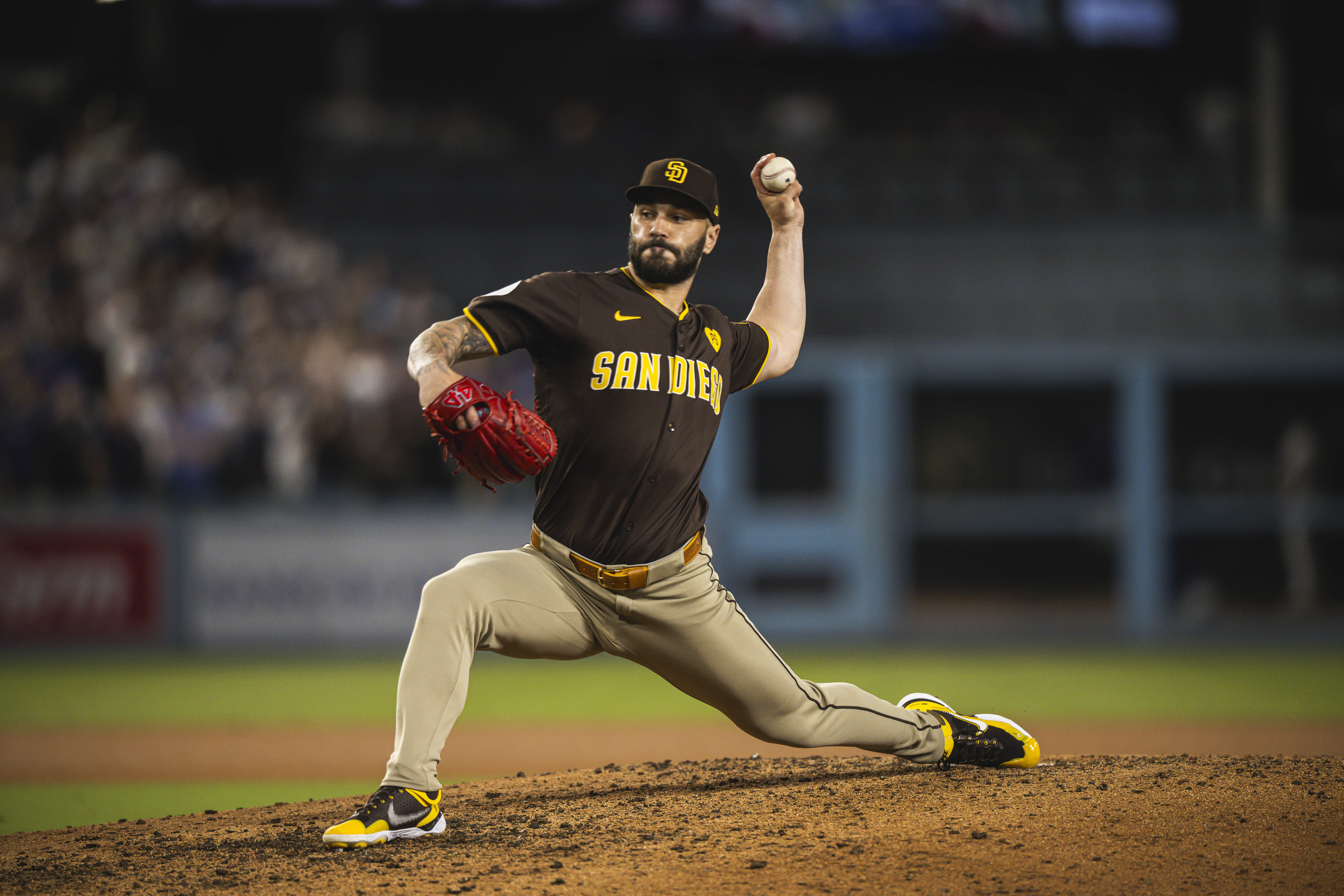 Top free agent reliever Tanner Scott (then of the San Diego Padres) pitches in the eighth inning of game five of the National League Divisional Series against the Los Angeles Dodgers at Dodger Stadium.