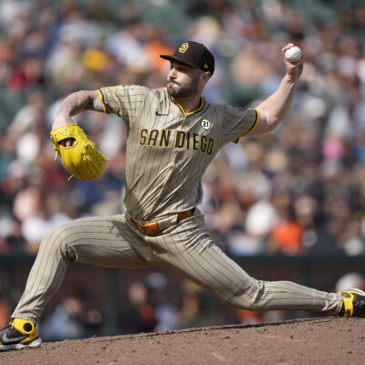 SAN FRANCISCO, CALIFORNIA - SEPTEMBER 15: Tanner Scott #66 of the San Diego Padres pitches against the San Francisco Giants in the bottom of the seventh inning at Oracle Park on September 15, 2024 in San Francisco, California. In honor of Roberto Clemente day some players around the league has chosen to wear the jersey number 21. (Photo by Thearon W. Henderson/Getty Images)
