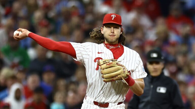 PHILADELPHIA, PENNSYLVANIA - SEPTEMBER 23: Alec Bohm #28 of the Philadelphia Phillies fields a ground ball during the fourth inning against the Chicago Cubs at Citizens Bank Park on September 23, 2024 in Philadelphia, Pennsylvania. (Photo by Tim Nwachukwu/Getty Images)