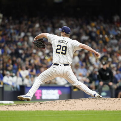 MILWAUKEE, WI - OCTOBER 03: Trevor Megill #29 of the Milwaukee Brewers pitches in the sixth inning during Game 3 of the Wild Card Series presented by T-Mobile 5G Home Internet between the New York Mets and the Milwaukee Brewers at American Family Field on Thursday, October 3, 2024 in Milwaukee, Wisconsin. (Photo by Aaron Gash/MLB Photos via Getty Images)