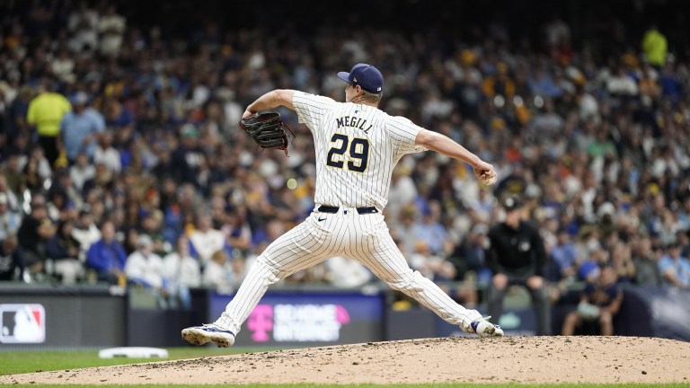 MILWAUKEE, WI - OCTOBER 03: Trevor Megill #29 of the Milwaukee Brewers pitches in the sixth inning during Game 3 of the Wild Card Series presented by T-Mobile 5G Home Internet between the New York Mets and the Milwaukee Brewers at American Family Field on Thursday, October 3, 2024 in Milwaukee, Wisconsin. (Photo by Aaron Gash/MLB Photos via Getty Images)