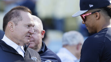 Sports agent Scott Boras talks to Juan Soto #22 of the New York Yankees during batting practice ahead of Game One of the 2024 World Series at Dodger Stadium.