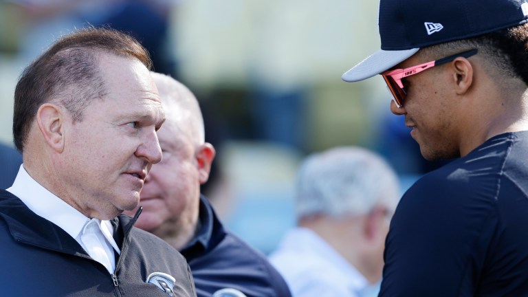 Sports agent Scott Boras talks to Juan Soto #22 of the New York Yankees during batting practice ahead of Game One of the 2024 World Series at Dodger Stadium.