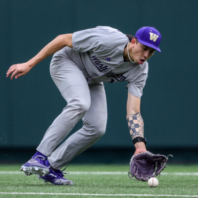 Washington infielder Aiva Arquette fields a ground ball during the college baseball game between Texas Longhorns and Washington Huskies.