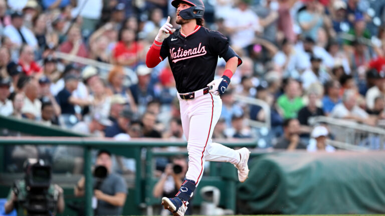 Dylan Crews of the Washington Nationals celebrates on the base paths his his first career home run in the first inning against the New York Yankees at Nationals Park.