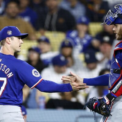 Free agent reliever David Robertson (then of the Texas Rangers) and Jonah Heim the third out against the Los Angeles Dodgers in the eighth inning at Dodger Stadium.