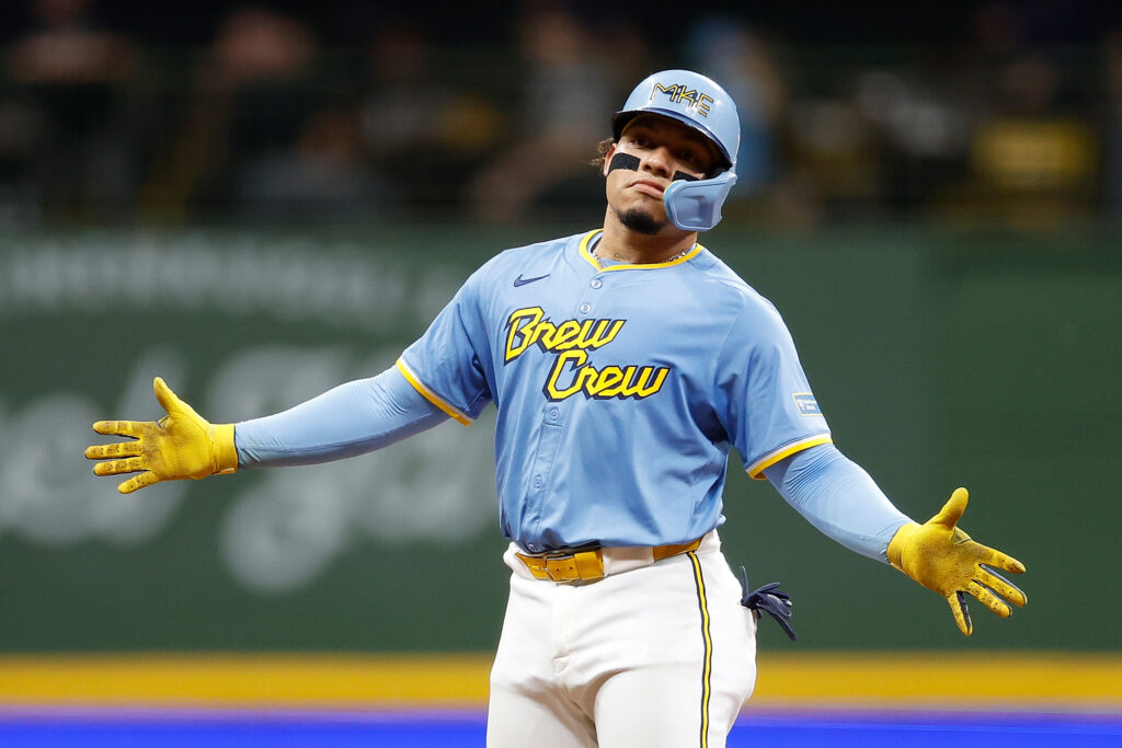 MILWAUKEE, WISCONSIN - AUGUST 09: William Contreras #24 of the Milwaukee Brewers reacts after tagging up and reaching second base on a caught fly ball in the fifth inning at American Family Field on August 09, 2024 in Milwaukee, Wisconsin. (Photo by John Fisher/Getty Images)