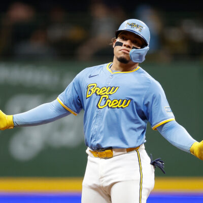 MILWAUKEE, WISCONSIN - AUGUST 09: William Contreras #24 of the Milwaukee Brewers reacts after tagging up and reaching second base on a caught fly ball in the fifth inning at American Family Field on August 09, 2024 in Milwaukee, Wisconsin. (Photo by John Fisher/Getty Images)