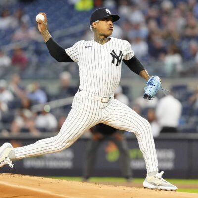New York Yankees Pitcher Marcus Stroman delivers a pitch during the first inning of the Major League Baseball game between the Kansas City Royals and the New York Yankees.