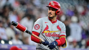 St. Louis Cardinals third baseman Nolan Arenado (28) warms up in the on deck circle in the first inning during a game between the St. Louis Cardinals and the Colorado Rockies at Coors Field.
