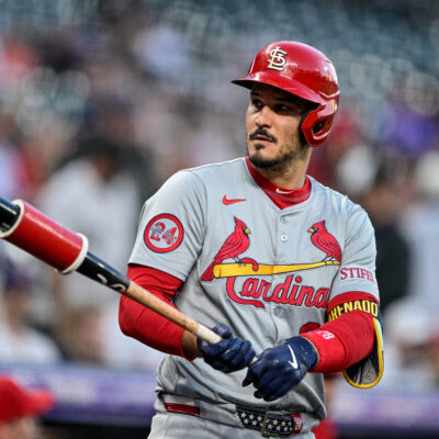 St. Louis Cardinals third baseman Nolan Arenado (28) warms up in the on deck circle in the first inning during a game between the St. Louis Cardinals and the Colorado Rockies at Coors Field.