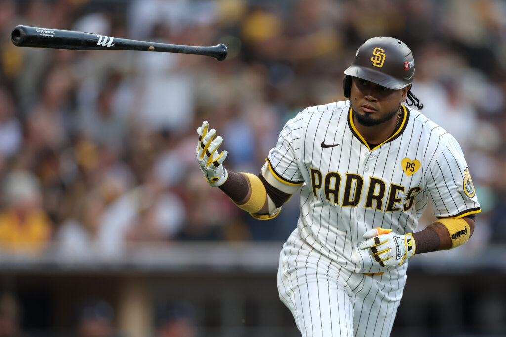 SAN DIEGO, CALIFORNIA - OCTOBER 01: Luis Arraez #4 of the San Diego Padres celebrates after hitting a single against AJ Smith-Shawver #32 of the Atlanta Braves during the first inning in Game One of the Wild Card Series at Petco Park on October 01, 2024 in San Diego, California. (Photo by Sean M. Haffey/Getty Images)