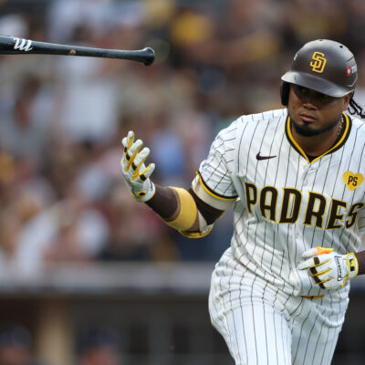 SAN DIEGO, CALIFORNIA - OCTOBER 01: Luis Arraez #4 of the San Diego Padres celebrates after hitting a single against AJ Smith-Shawver #32 of the Atlanta Braves during the first inning in Game One of the Wild Card Series at Petco Park on October 01, 2024 in San Diego, California. (Photo by Sean M. Haffey/Getty Images)