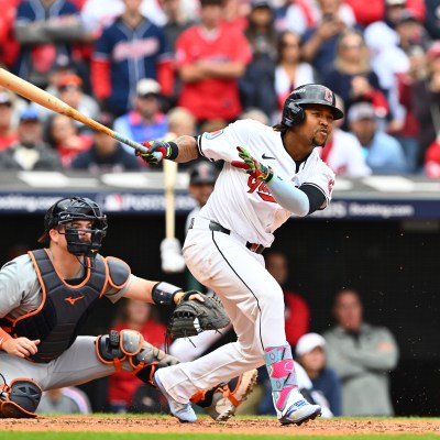 CLEVELAND, OHIO - OCTOBER 12: José Ramírez #11 of the Cleveland Guardians hits a single during the seventh inning against the Detroit Tigers during Game Five of the Division Series at Progressive Field on October 12, 2024 in Cleveland, Ohio. (Photo by Jason Miller/Getty Images)