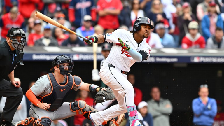 CLEVELAND, OHIO - OCTOBER 12: José Ramírez #11 of the Cleveland Guardians hits a single during the seventh inning against the Detroit Tigers during Game Five of the Division Series at Progressive Field on October 12, 2024 in Cleveland, Ohio. (Photo by Jason Miller/Getty Images)