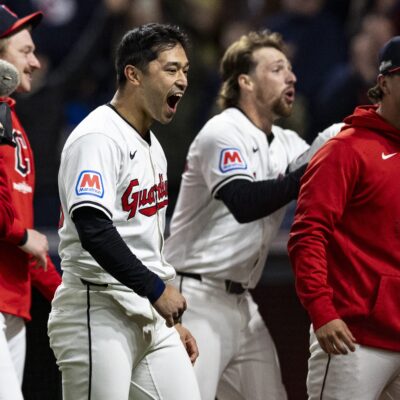 CLEVELAND, OH - OCTOBER 17: Steven Kwan #38 of the Cleveland Guardians celebrates after the Guardians win in a walk off during Game 3 of the ALCS presented by loanDepot between the New York Yankees and the Cleveland Guardians at Progressive Field on Thursday, October 17, 2024 in Cleveland, Ohio. (Photo by Lauren Leigh Bacho/MLB Photos via Getty Images)