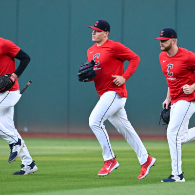CLEVELAND, OHIO - OCTOBER 19: Cade Smith #36, Erik Sabrowski #62 and Andrew Walters #63 of the Cleveland Guardians run off the field prior to Game Five of the American League Championship Series against the New York Yankees at Progressive Field on October 19, 2024 in Cleveland, Ohio. (Photo by Nick Cammett/Diamond Images via Getty Images)