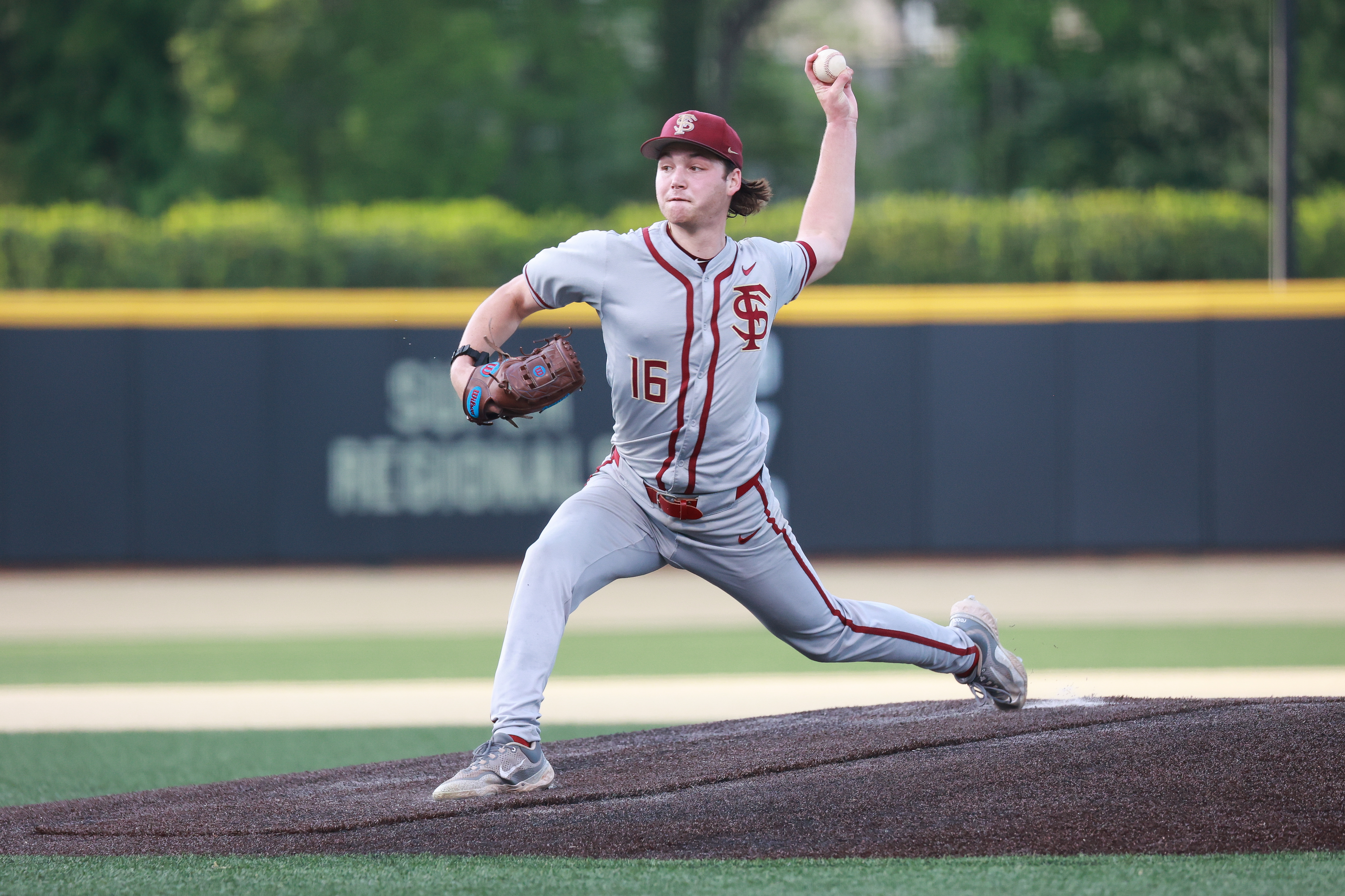 Jamie Arnold of the Florida State Seminoles pitches against the Wake Forest Demon Deacons at David F. Couch Ballpark.