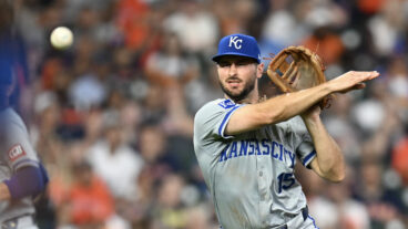 Paul DeJong of the Kansas City Royals throws to first base against the Houston Astros during the third inning at Minute Maid Park.