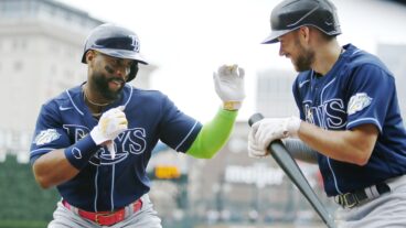 Yandy Diaz of the Tampa Bay Rays celebrates with Brandon Lowe after hitting a two-run home run during the second inning against the Detroit Tigers Comerica Park.