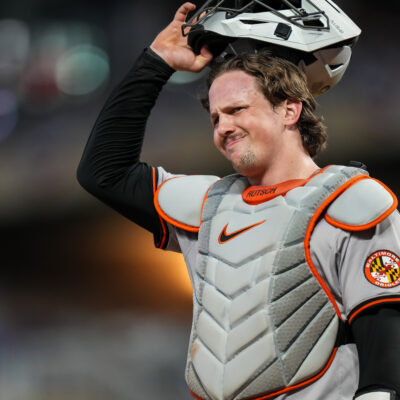 Adley Rutschman of the Baltimore Orioles looks on against the Minnesota Twins.