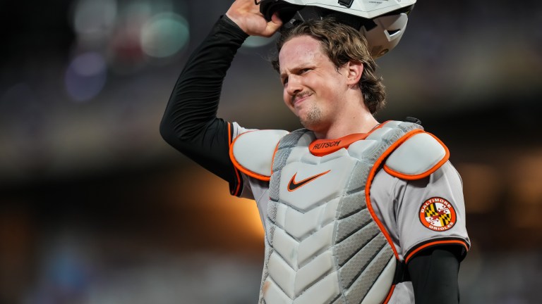 Adley Rutschman of the Baltimore Orioles looks on against the Minnesota Twins.