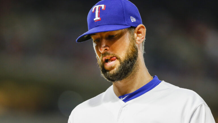 Texas Rangers relief pitcher Chris Martin walks back to the dugout during the game between the Texas Rangers and the Los Angeles Angels.