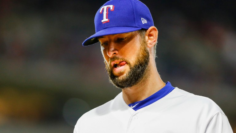 Texas Rangers relief pitcher Chris Martin walks back to the dugout during the game between the Texas Rangers and the Los Angeles Angels.