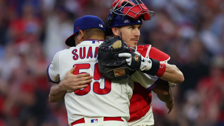 PHILADELPHIA, PA - SEPTEMBER 25: Pitcher Ranger Suarez #55 of the Philadelphia Phillies is congratulated by catcher J.T. Realmuto #10 after pitching a complete game shutout as the Phillies defeated the Pittsburgh Pirates 3-0 at Citizens Bank Park on September 25, 2021 in Philadelphia, Pennsylvania. (Photo by Rich Schultz/Getty Images)