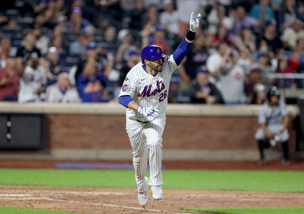 .D. Martinez of the New York Mets celebrates his walk off two run home run in the bottom of the ninth to defeat the Miami Marlins at Citi Field on June 13, 2024 in Flushing neighborhood of the Queens borough of New York City. The New York Mets defeated the Miami Marlins 3-2.