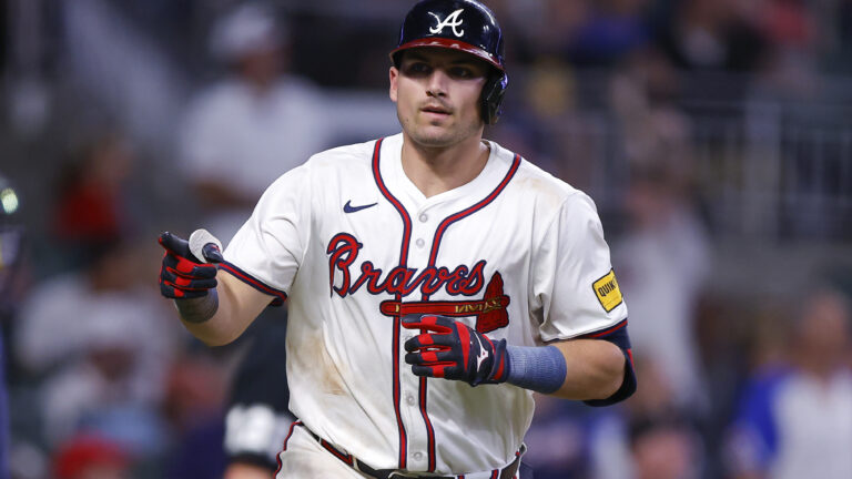ATLANTA, GEORGIA - AUGUST 7: Austin Riley #27 of the Atlanta Braves reacts after hitting a two run home run during the fifth inning against the Milwaukee Brewers at Truist Park on August 7, 2024 in Atlanta, Georgia. (Photo by Todd Kirkland/Getty Images)