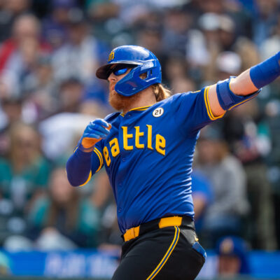 SEATTLE, WA - SEPTEMBER 15: Justin Turner #2 of the Seattle Mariners takes a swing during an at-bat in a game against the Texas Rangers at T-Mobile Park on September 15, 2024 in Seattle, Washington. Players are wearing #21 in honor of Roberto Clemente Day. (Photo by Stephen Brashear/Getty Images)