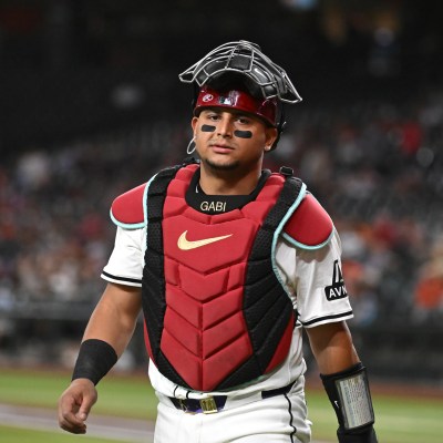 PHOENIX, ARIZONA - SEPTEMBER 25: Gabriel Moreno #14 of the Arizona Diamondbacks walks back to the dugout against the San Francisco Giants at Chase Field on September 25, 2024 in Phoenix, Arizona. (Photo by Norm Hall/Getty Images)