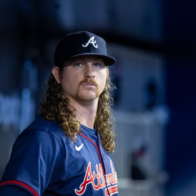 Grant Holmes of the Atlanta Braves looks on from the dugout during the game between the Atlanta Braves and the Miami Marlins at loanDepot park.