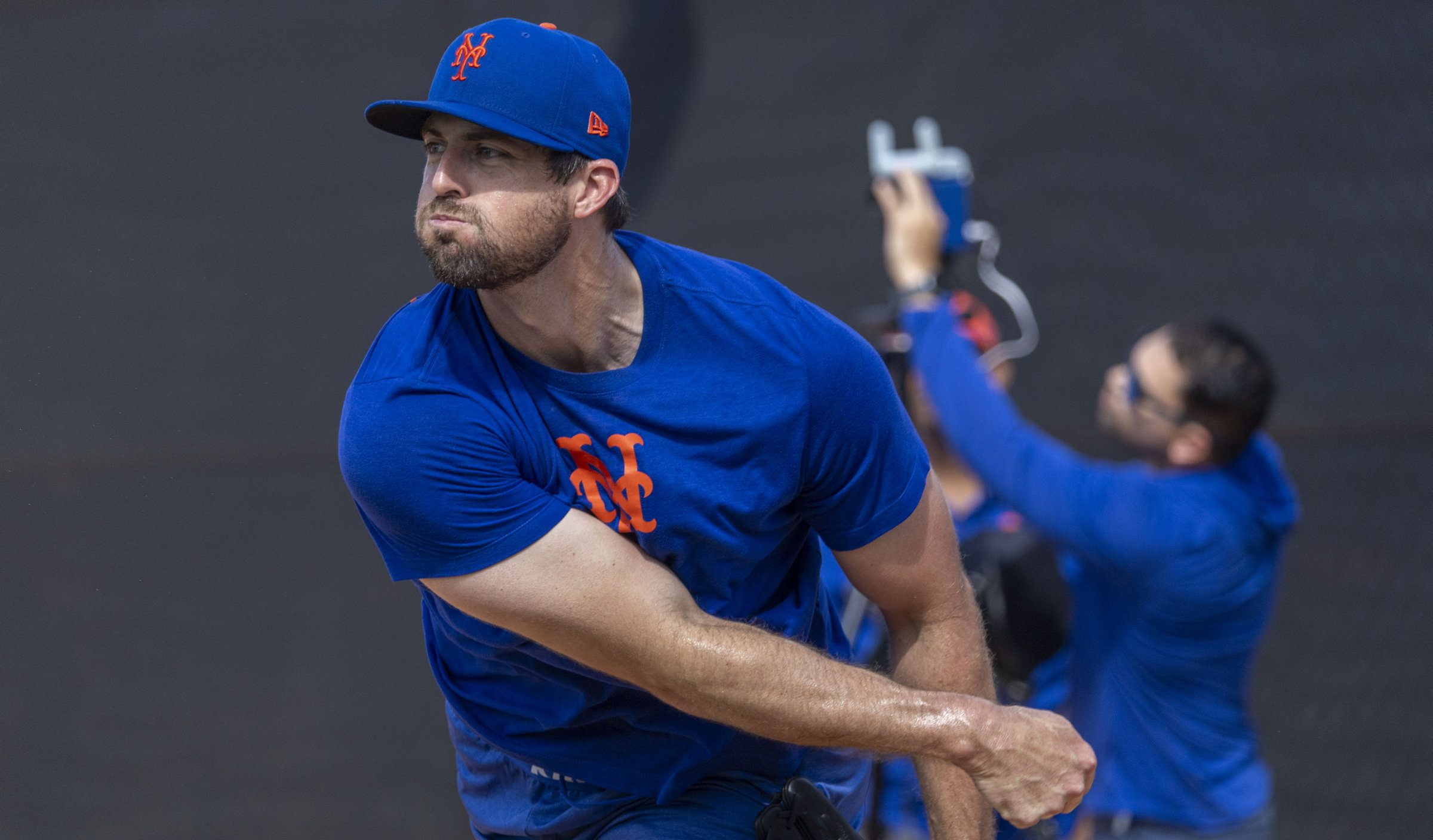 New York Mets pitcher Clay Holmes throws during a spring training workout.