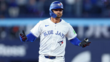 Andrés Giménez of the Toronto Blue Jays jogs around the bases after hitting a two-run home run against the Baltimore Orioles during the fourth inning on Opening Day at Rogers Centre.