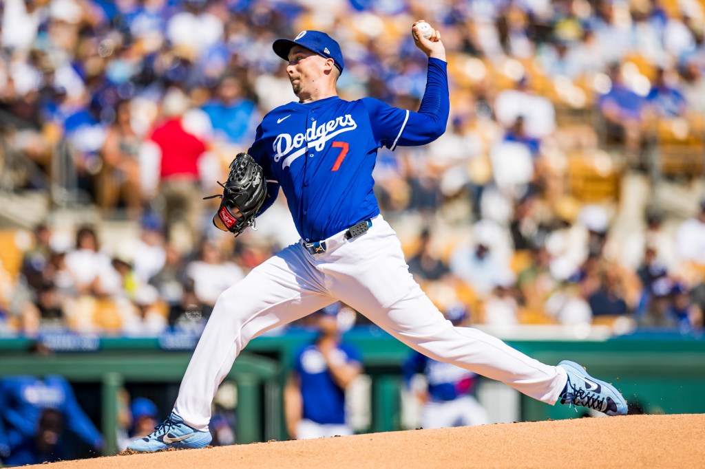 Blake Snell of the Los Angeles Dodgers pitches during the first inning of a Spring Training game against the Athletics at Camelback Ranch.