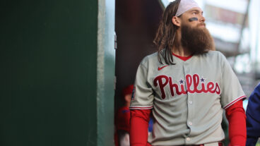 Brandon Marsh of the Philadelphia Phillies looks on in the dugout in the tenth inning during the game between the Philadelphia Phillies and the Washington Nationals at Nationals Park.