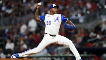 Raisel Iglesias of the Atlanta Braves delivers a pitch during the ninth inning against the Kansas City Royals at Truist Park.
