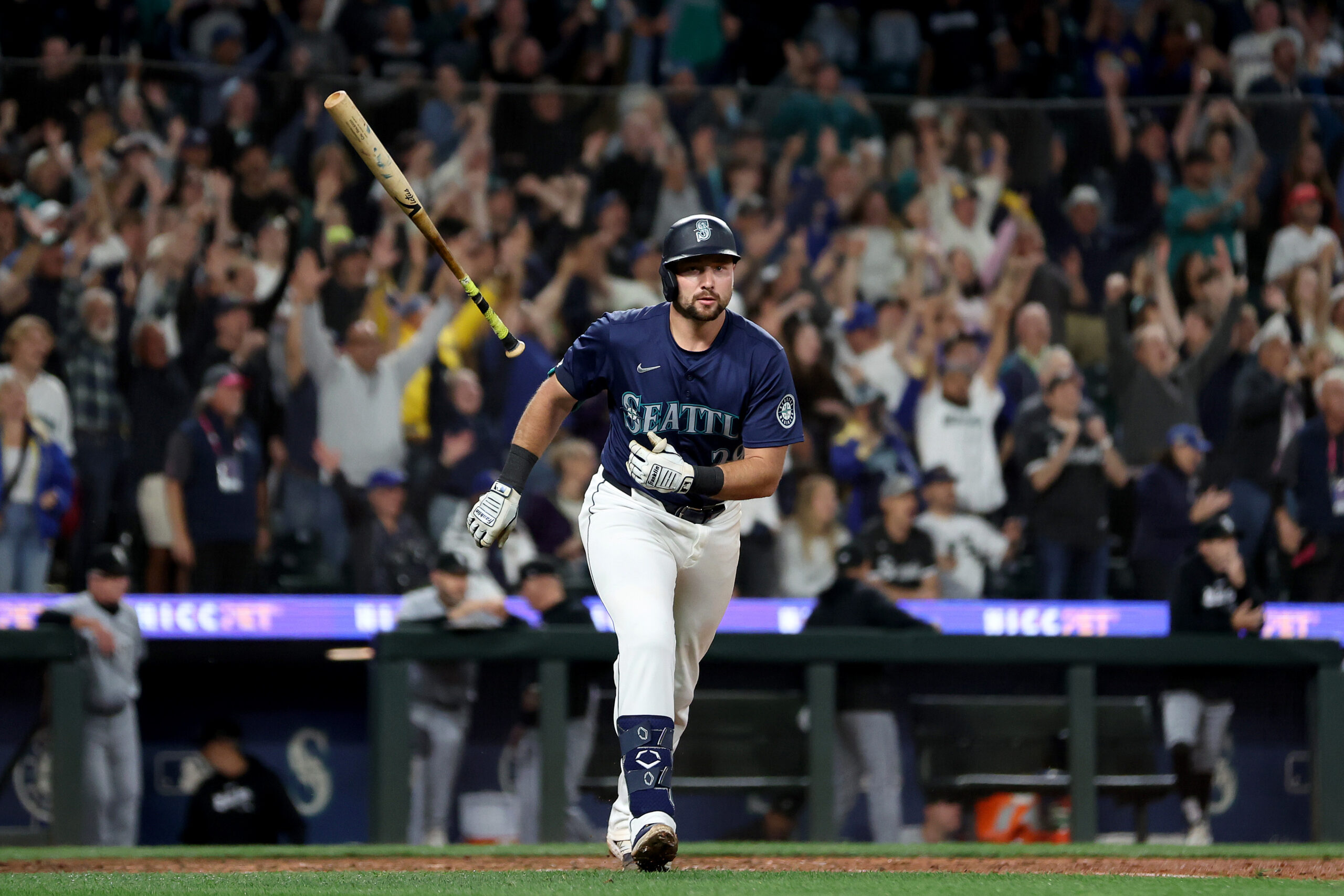 Cal Raleigh of the Seattle Mariners celebrates his walk-off grand slam to beat the Chicago White Sox at T-Mobile Park.
