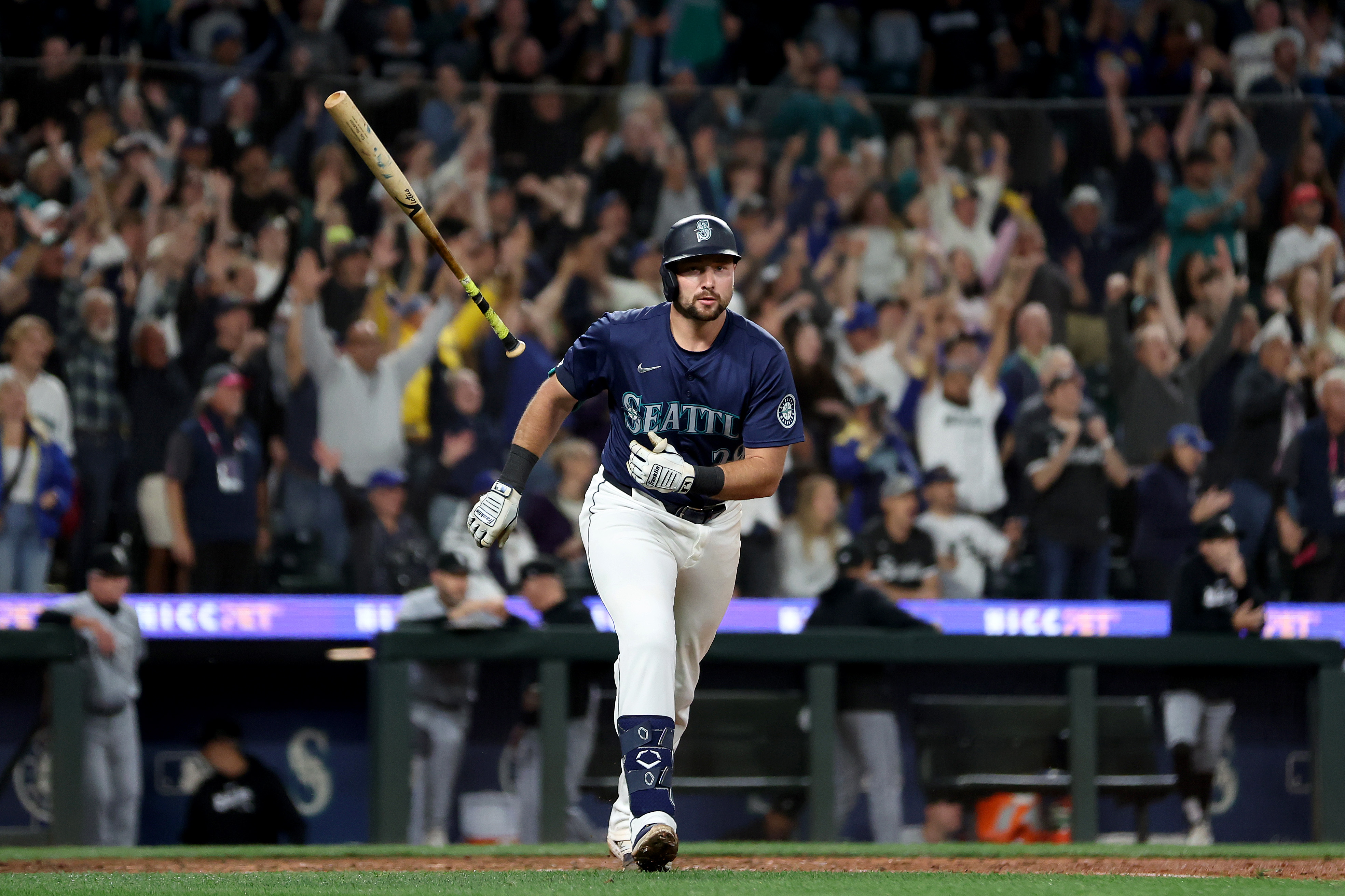 Cal Raleigh of the Seattle Mariners celebrates his walk-off grand slam to beat the Chicago White Sox at T-Mobile Park.