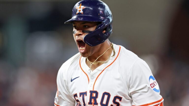 HOUSTON, TEXAS - MARCH 27: Cam Smith #11 of the Houston Astros celebrates after hitting an RBI single against the New York Mets during the second inning on Opening Day at Daikin Park on March 27, 2025 in Houston, Texas. (Photo by Tim Warner/Getty Images)
