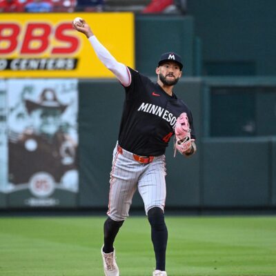 Carlos Correa of the Minnesota Twins throws to first base for an out against the St. Louis Cardinals in the fifth inning on Opening Day at Busch Stadium.
