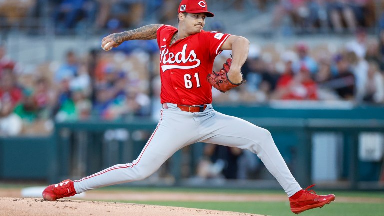 GLENDALE, ARIZONA - MARCH 4: Chase Petty #61 of the Cincinnati Reds delivers a pitch in the first inning during a spring training game against the Los Angeles Dodgers at Camelback Ranch on March 4, 2025 in Glendale, Arizona. (Photo by Brandon Sloter/Getty Images)