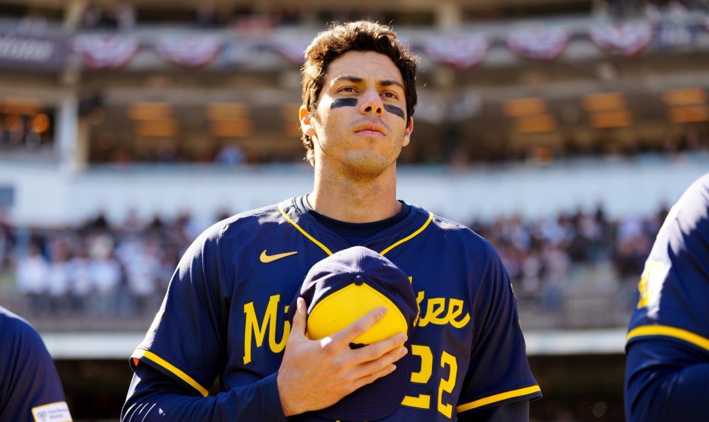 NEW YORK, NY - MARCH 27:  Christian Yelich #22 of the Milwaukee Brewers looks on during the singing of national anthem prior to the game between the Milwaukee Brewers and the New York Yankees at Yankee Stadium on Thursday, March 27, 2025 in New York, New York. (Photo by Mary DeCicco/MLB Photos via Getty Images)
