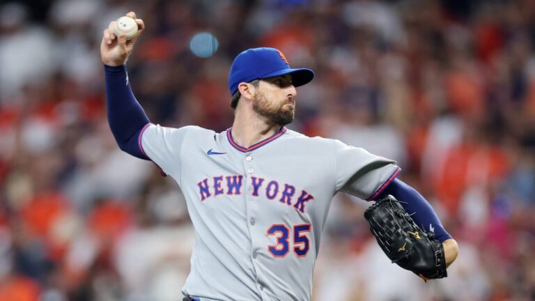 Clay Holmes of the New York Mets pitches against the Houston Astros during the first inning on Opening Day at Daikin Park.