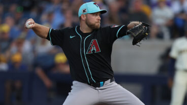 Corbin Burnes of the Arizona Diamondbacks pitches in the first inning during the spring training game against the Milwaukee Brewers at American Family Field of Phoenix.